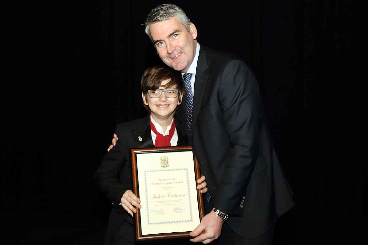 Premier Stephen McNeil with Joshua Cochrane