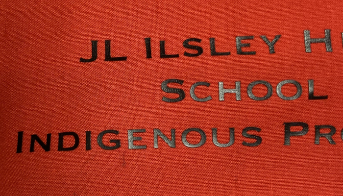 close up image of a jandmade blanket and the words J.L. Ilsley High School Indigenous Pro-